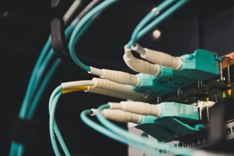 Telecommunication cables plugged into a server.